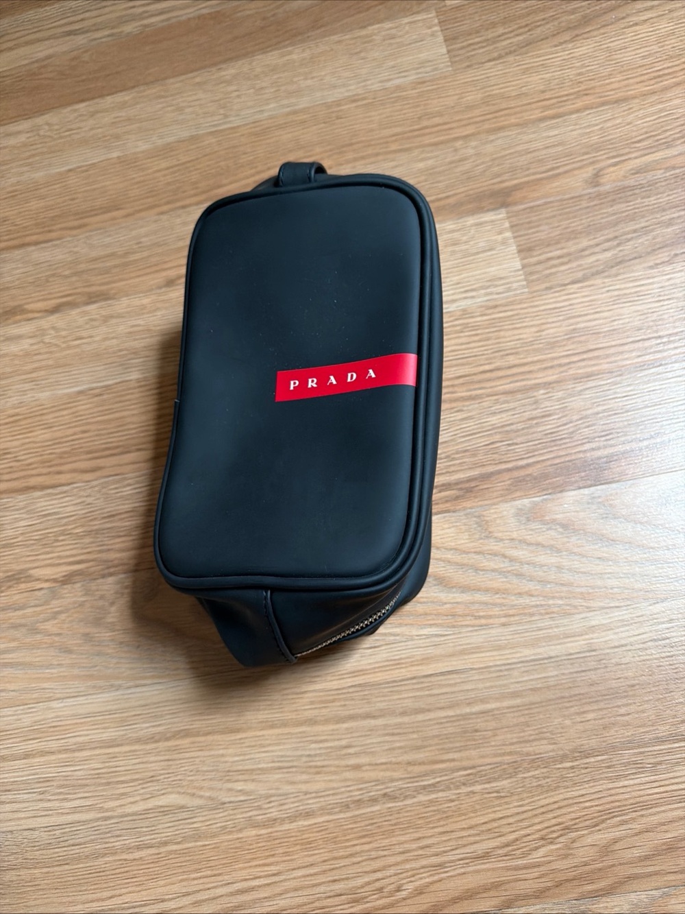 Prada Black Toiletry Pouch with Red Logo Stripe